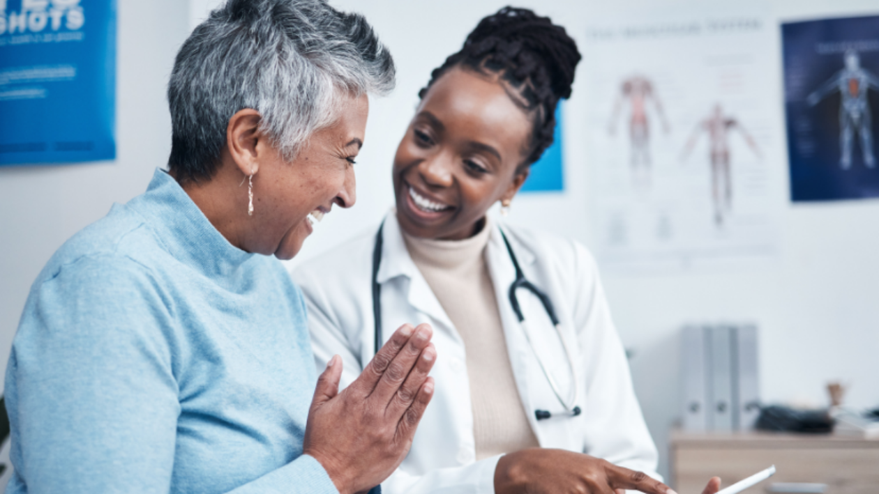 Female doctor having a discussion with female patient