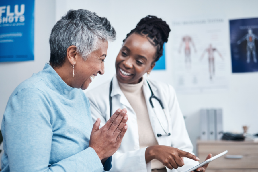 Female doctor having a discussion with female patient